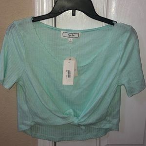 brand new turquoise crop top with a knot on front